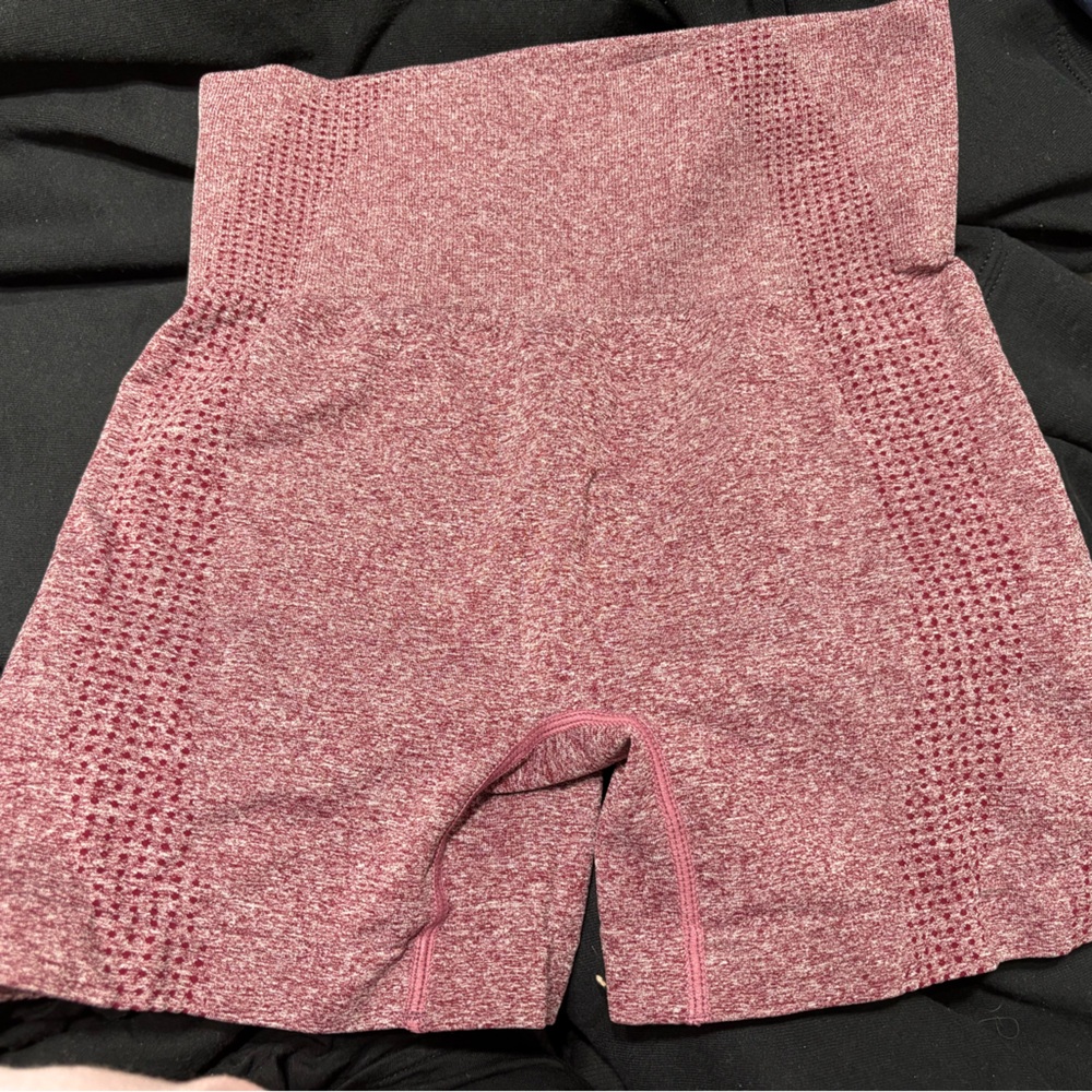 2 pairs of athletic workout shorts. Size medium fits like a size 4